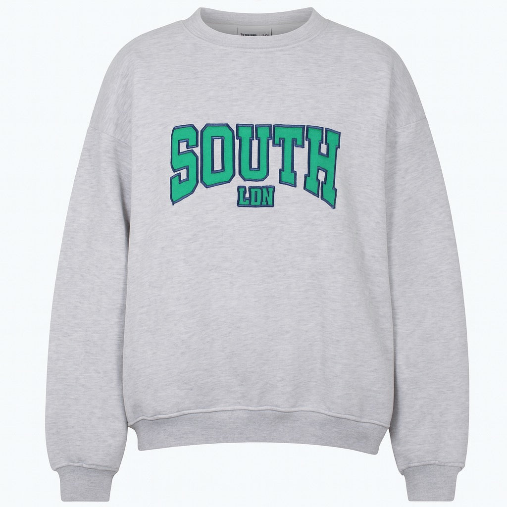 Gray sweatshirt with 'SOUTH LON' printed in green on a white background